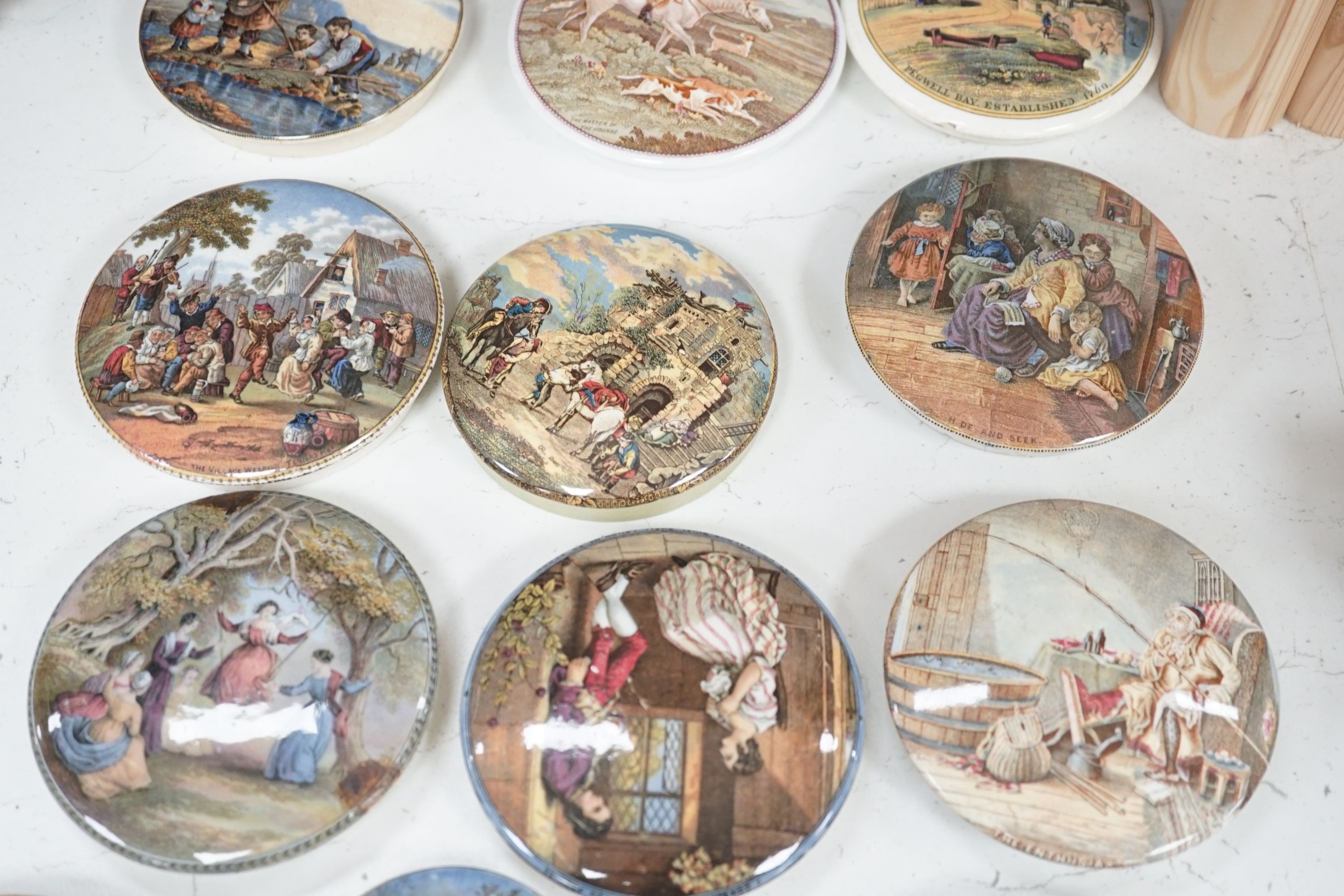 A collection of 20 Victorian pot lids